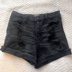 black ripped shorts